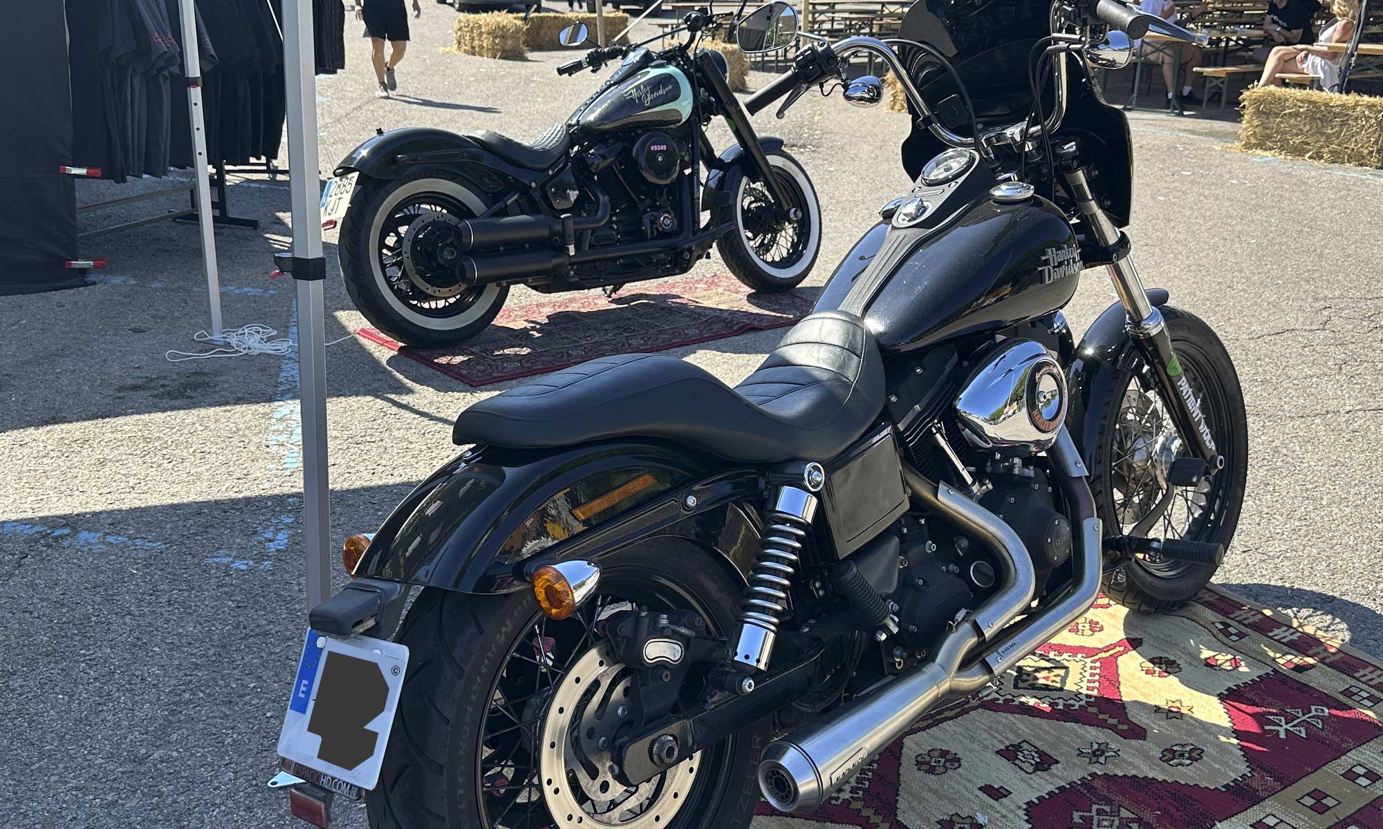 Harley-Davidson with a 2-into-1 exhaust compared with a Harley fitted with 2-into-2 exhausts.